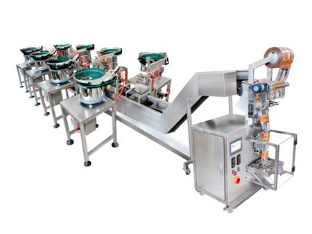 ماكينة عد وتعبئة المسامير والصواميل مع 8 مغذي هزاز (ماكينة تعبئة وتغليف رأسية MK-LS8)                   Counting Packaging Machine (VFFS Machine)